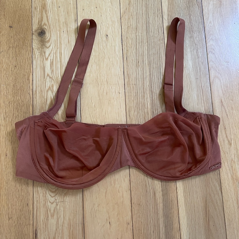 Brown Balconette bra by SKIMS